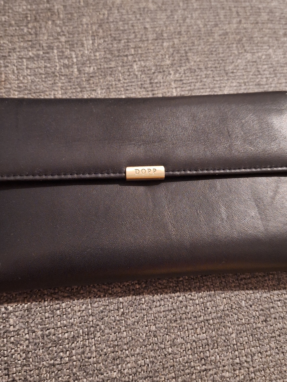 Dopp Black Leather Clutch with Gold Accent
